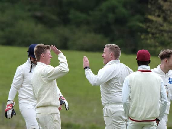Scalby celebrate a wicket earlier this season against Staxton