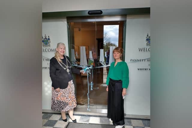 Cllr Linda Wild at Whitby Museum and Pannett Art Gallery's new touch-free door,with curator Helen Berry.