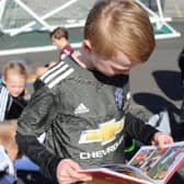 Robbie Hawkes has gifted over 500 Roy of the Rovers books to those attending his football sessions