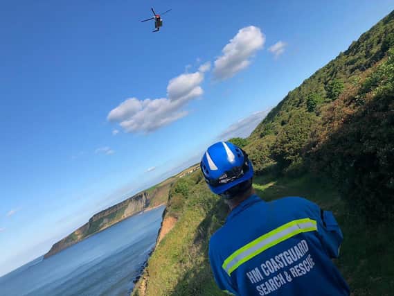 The Coastguard helicopter was called to an injured walker.