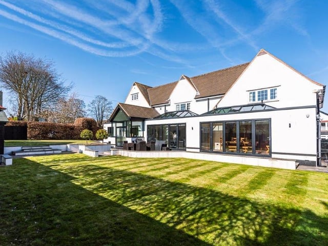Stretch of lawn within the gardens of the impressive Scalby home