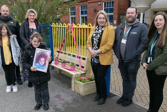 Back, parents Alan and Kelly Rogers, Friarage School headteacher Cheryl Cappleman, Beyond Housing Communities Advisor John Bateman and Community Connector Laura Young; front, Jessica’s school friend Holly Fisher with Jessica’s sister Daisy Rogers, holding a photo of Jessica. (Photo: Kevin Allen)