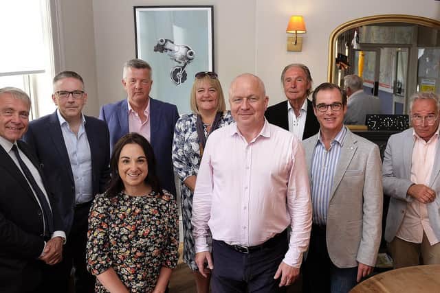 Christianne Lane and Simon Rhatigan, front centre, greet local business representatives. Picture: JPI Media/ Richard Ponter