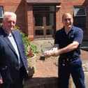 Bill Adams, TUC Regional Secretary for Yorkshire and the Humber region, presents Franco Villani (right) with his health and safety award.