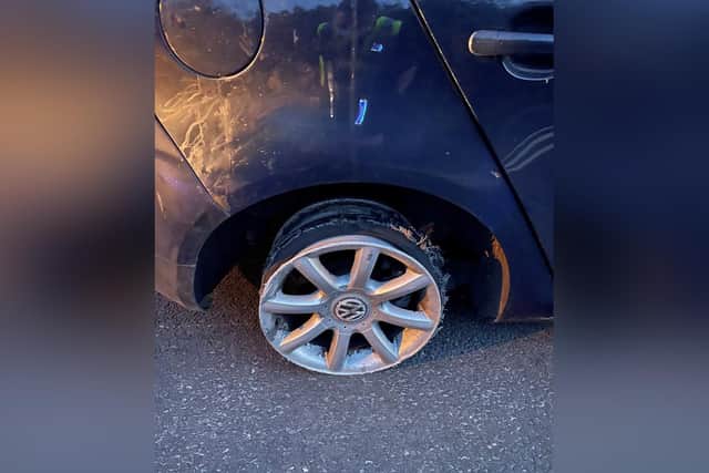 Police officers were shocked to discovered the car was missing a rear tyre.
