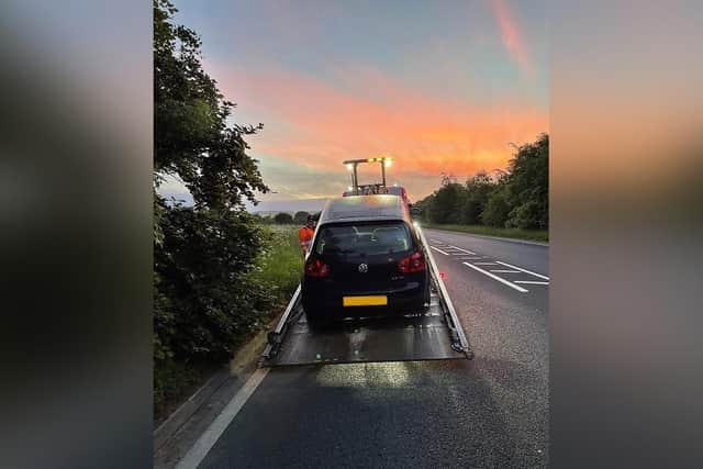 The car was seized by police and taken away on a recovery truck.