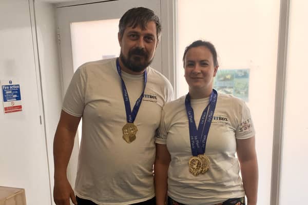 Lifters Craig Wilkinson and Kimberley Vickers are pictured with their medals.