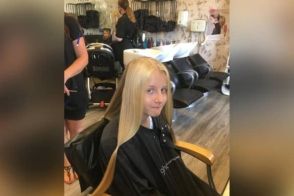 Imogen Moon ready to have her hair cut for the Little Princess Trust.