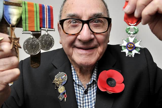 Maurice pictured with his medals in 2015.