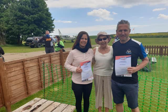 Fiona Sellers and Keith Wallace having completed their sky dives.