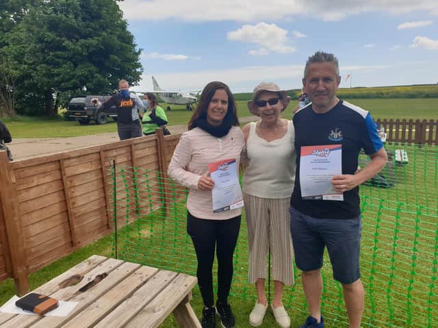 Fiona Sellers and Keith Wallace having completed their sky dives.