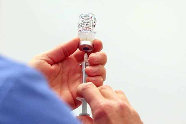 A vial of the Moderna Covid-19 vaccine. Photo by Steve Parsons / POOL / AFP via Getty Images