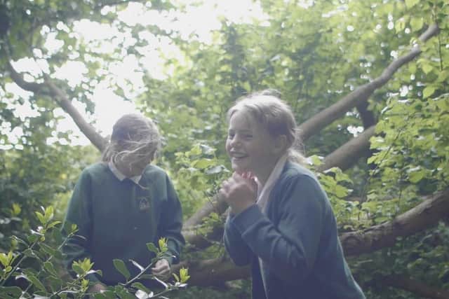 Children from Airy Hill Primary in a scene from the Healthy Schools video