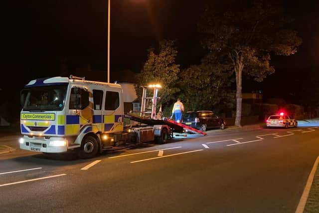 A car being towed after the driver was stopper by police on suspicion of taking without the owner's consent and drink driving. Picture: North Yorkshire Police