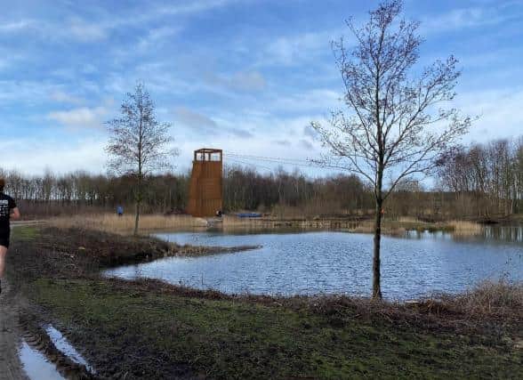 An artist's impression of the activity tower and zip lines.