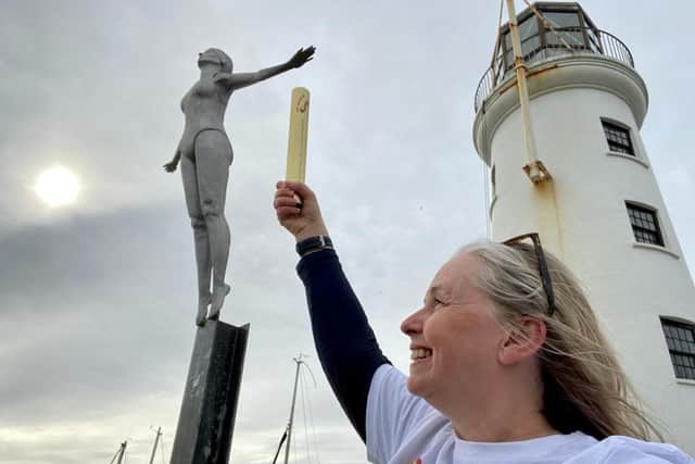 Caroline Powell at the Diving Belle statue on Lighthouse Pier in Scarborough.