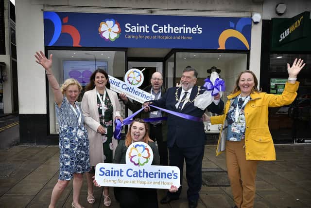 The new St Catherine's Hospice shop opens on Westborough with Mayor Eric Broadbent doing the honours alongside Manager Jo Major, left, Tracy Calcraft, Mike Wilkerson, Jade Jarvie, and Suzanne Burnett.