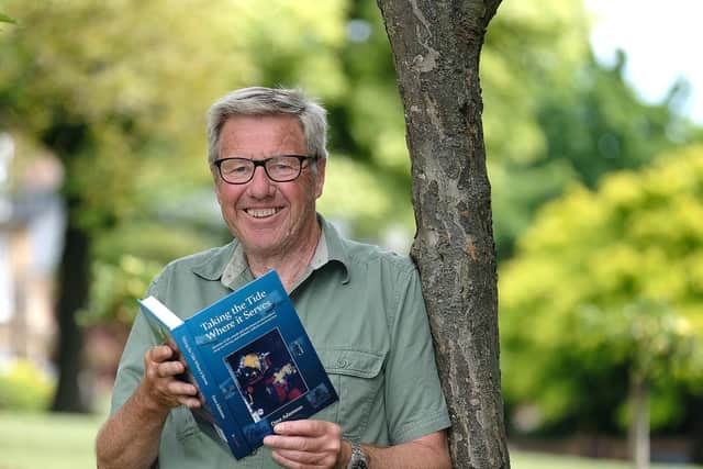 David Adamson with his autobiography