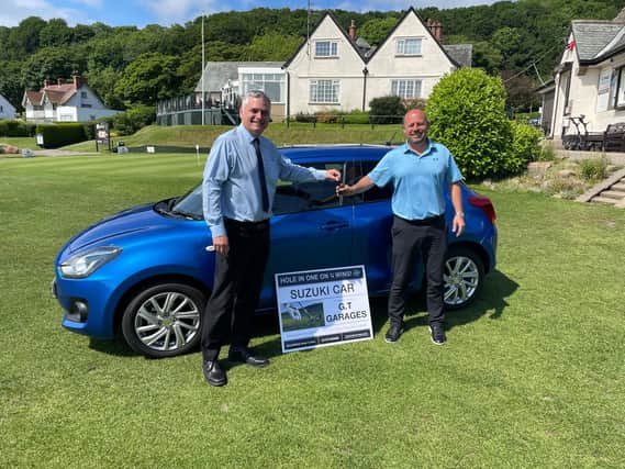 The Suzuki Swift car on offer for a hole in one, courtesy of GT Garages Scarborough. Pictured are Nick Borthwick (GT Garages) and Shaun Smith (Club Manager)