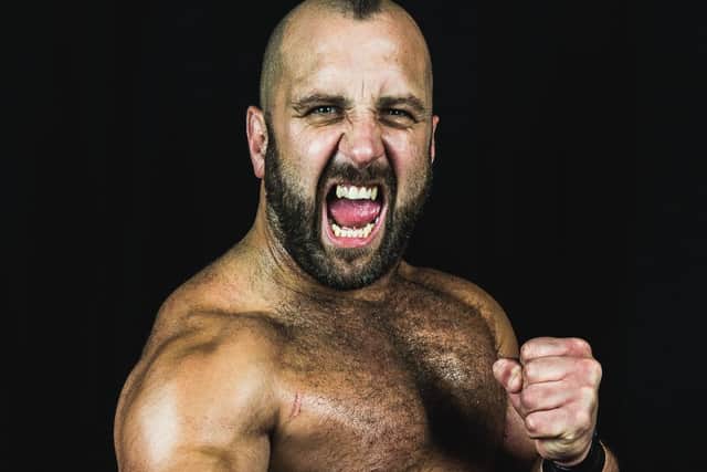 Nottingham’s real life Action Man Stixx – a muscle bound giant of the ring. Photo courtesy of Chris Kirkham