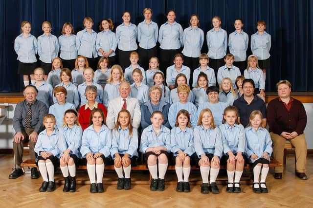 Bridlington Girls Choir members are pictured in their new uniforms at Hilderthorpe School in 2003. Do you recognise any of the people in the photograph? The picture was taken by Paul Atkinson. (PA0348-9)