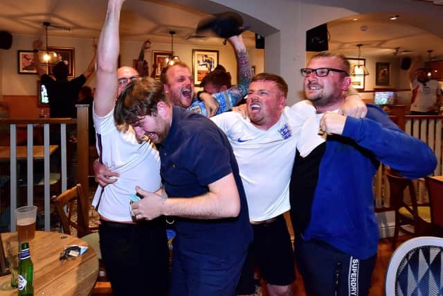 Fans enjoy England's historic 2-0 win over Germany.
