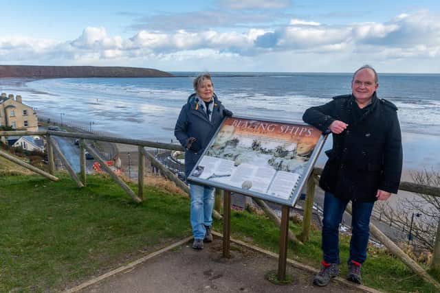 James Hodgson, Director of Filey Bay 1779 Research Group, with Kim Hodgson at the battle’s memorial board.