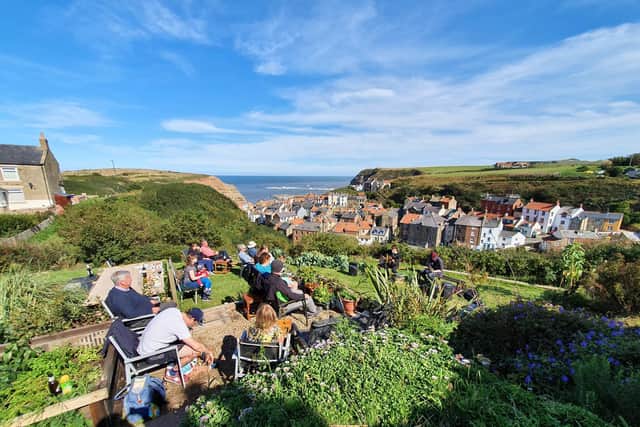 Whitby singer-songwriter Alistair Griffin performing a lockdown gig in a garden in Staithes.