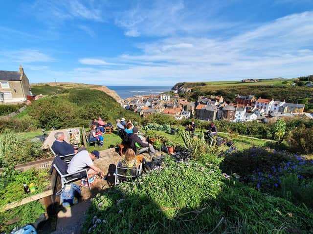 Whitby singer-songwriter Alistair Griffin performing a lockdown gig in a garden in Staithes.