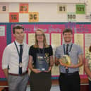Some of the winning Malton School maths department members with their TES awards