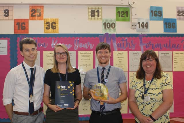 Some of the winning Malton School maths department members with their TES awards