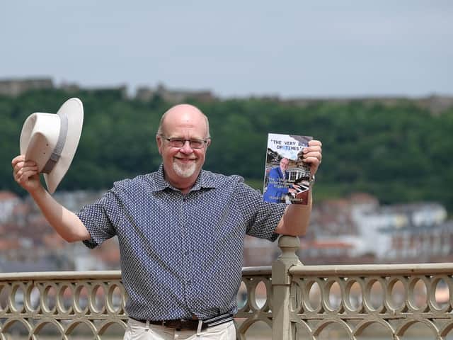 Howard Beaumont with his new book