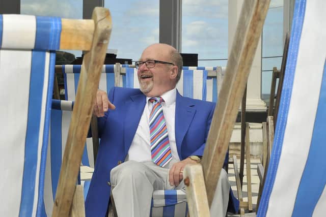 Howard Beaumont in the Sun Court where he is the resident organist for the summer season