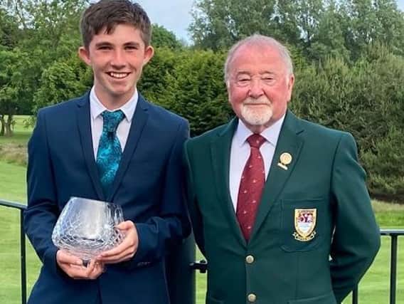Winner Josh Logue with South Cliff Captain Neil Wrigglesworth