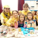 This excellent picture shows the Brownie and Rainbow Stall during St John Burlington Methodist Church’s Christmas Fayre in the School Room. Photograph taken by Paul Atkinson. (PA0347-27b)