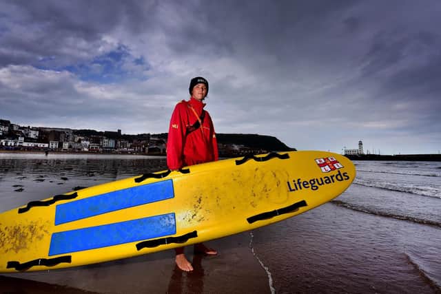 Carolina Clements with her paddle board - Pic: Richard Ponter
