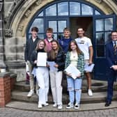 Students celebrate on the school steps with headmaster Guy Emmett, right. Picture: Scarborough College.