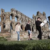 Visitors to Whitby Abbey earlier this year.