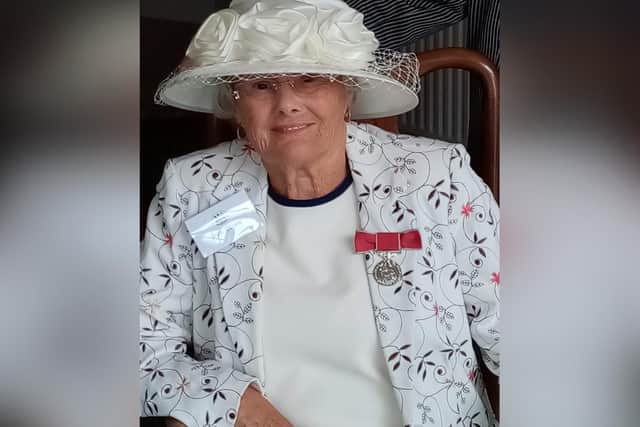 Jean Dixon with her British Empire Medal.