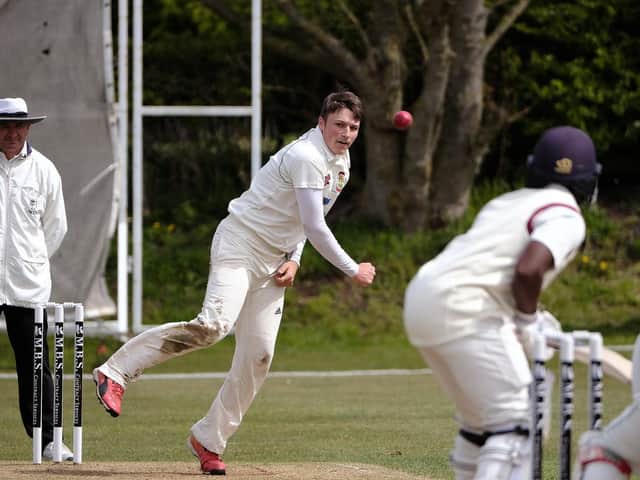Elliot Hatton, in bowling action, top-scored with the bat for Flixton