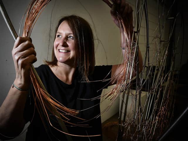 Emma Stothard works on her sculpture in her Whitby studio.
