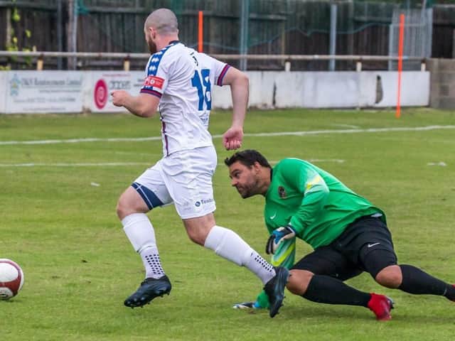 Bradley Fewster in action for Whitby Town.