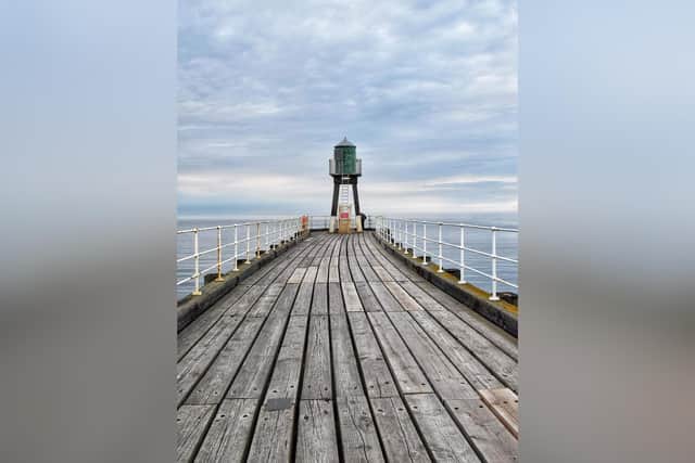 One of Kieran Delaney's pictures, from the ground this time, of Whitby's west pier.