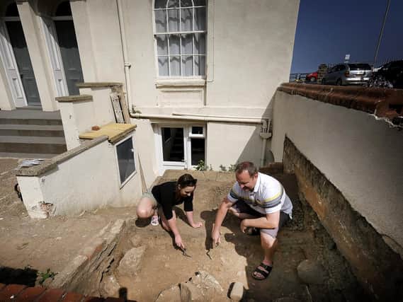 An excavation dig is taking place at Phoenix Court ... Marie Woods and Phoenix Court owner Mike Buttery on site.