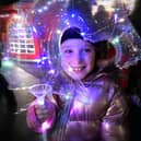 A youngsters enjoys the lantern parade at a previous Whitby Christmas Festival.