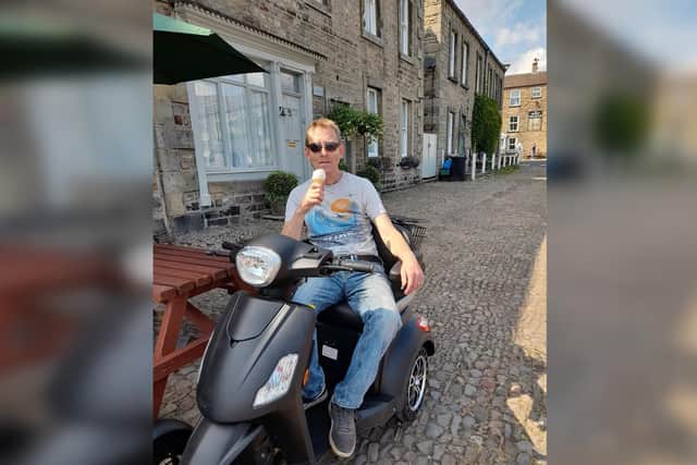 A mobility scooter has enabled Antony and Lou to go for walks together