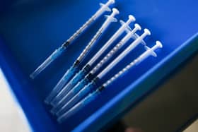 Syringes of the Pfizer-BioNTech Covid-19 Vaccine. (Photo by Ian Forsyth/Getty Images)