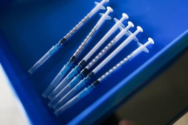 Syringes of the Pfizer-BioNTech Covid-19 Vaccine. (Photo by Ian Forsyth/Getty Images)