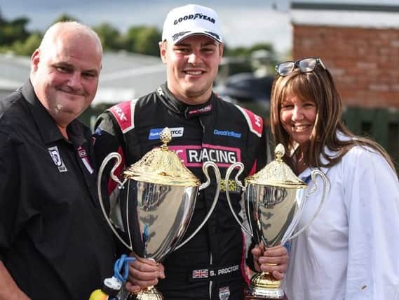 Senna Proctor shows off  his trophies after his Oulton Park win with proud parents Mark and Justine Proctor

Photo by Gavin Proc Photography