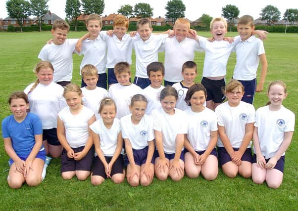 This photograph features one of the schools taking part in a competition at Dukes Park – the Rugby Club Inter Schools Tag Rugby. Do you recognise any of the people in the picture? Photograph taken by Paul Atkinson (PA0527-8c)
